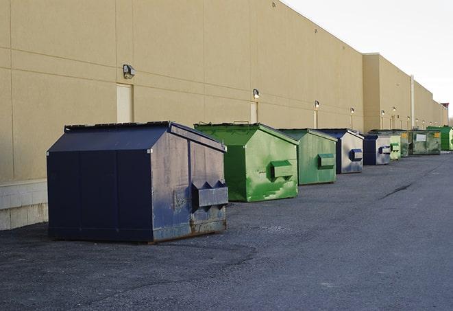 an arrangement of durable and robust disposal containers utilized on a construction project in Colfax